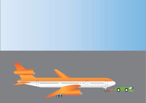 An Orange and Silver Airliner being towed by a Pushback Tractor