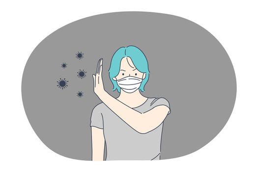 Danger or coronavirus infection epidemic, protective facial mask, pandemic concept. Young woman in medical protective mask standing and protecting herself from corona bacteria flow outside