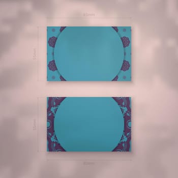 Business card in turquoise with Indian purple pattern for your personality.