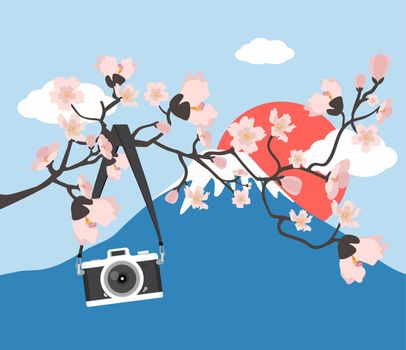 camera hanging pink floral branch with Mount Fuji