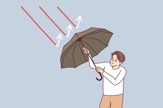 Confident businessman holding umbrella protect from red arrows. Business man recover from economic recession and crisis. Flat vector illustration.