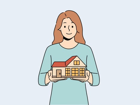 Smiling woman holding house model in hands. Happy female real estate agent with home maquette recommend service to client. Realty and rent. Vector illustration.