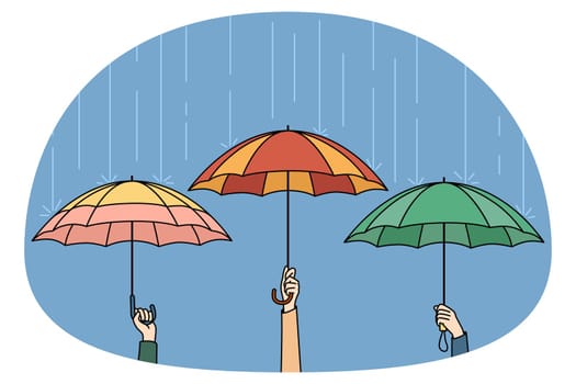 Hands holding colorful umbrellas hiding from rain in city. People outside on rainy weather. Storm and safety concept. Vector illustration.