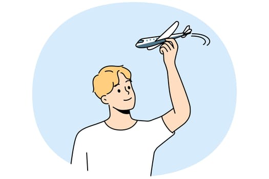 Young man have fun playing with airplane model. Smiling guy flying with plane miniature. Aviation and hobby. Vector illustration.