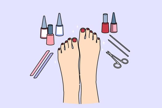 Woman feet after pedicure procedure, with nail polish and scissors or files near well-groomed painted nails. Pedicure services for ladies, making toes more attractive, for wearing open shoes