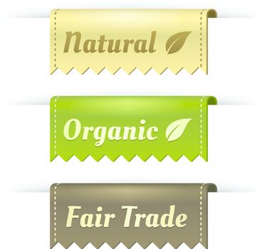 Stylish Fair Trade, Natural, and Organic vector label tag set. These elements look like tabs folded over the side of a pocket. Leaf is included on banners to symbolize the eco-friendly nature. Could be used in print. Great for websites.