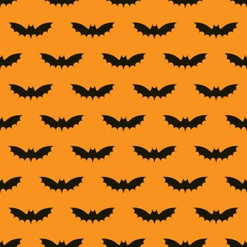 Seamless pattern with bats on orange background