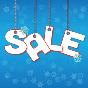 Winter Sale Letters hanging on ropes with snowflakes