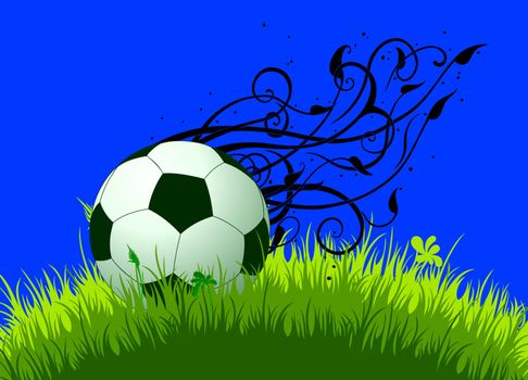 green and white football ball on the grass, decorated with vegetal elements