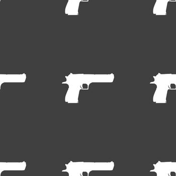 gun icon sign. Seamless pattern on a gray background. Vector illustration