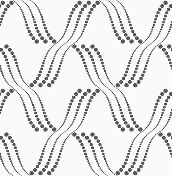 Monochrome dotted texture. Abstract seamless pattern. Ornament made of dots.Textured with dots reticulated tile.