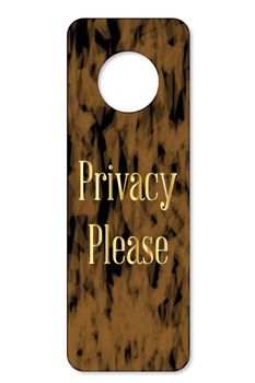A door knob sign with the legend privacy please