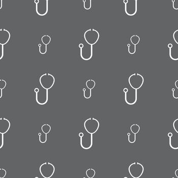 Stethoscope Icon sign. Seamless pattern on a gray background. Vector illustration