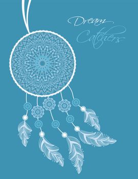 Dreamcatcher with feathers on a blue background