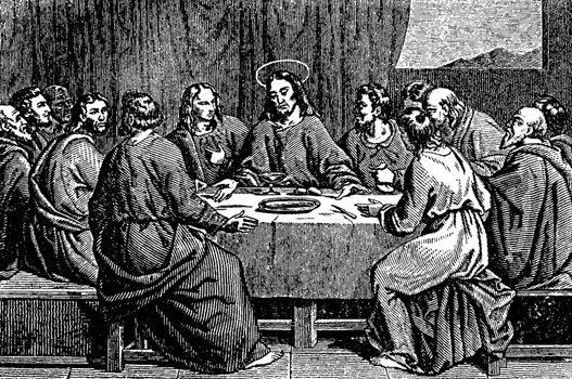 Jesus communicating with His disciples at the last Supper, vintage line drawing or engraving illustration.