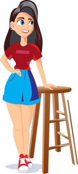 girl standing besides table