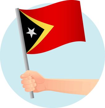 East Timor flag in hand. Patriotic background. National flag of East Timor vector illustration