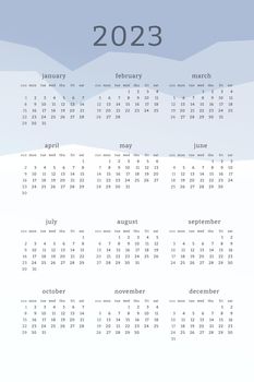 Vertical blue calendar for 2023 year. Mountains silhouettes abstract gradient colorful background. Calendar design for print and digital. Week starts on Sunday.