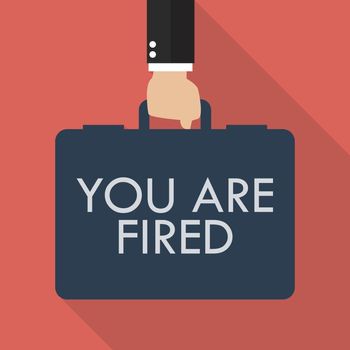 Businessman hand holding briefcase with words You are fired. vector illustration