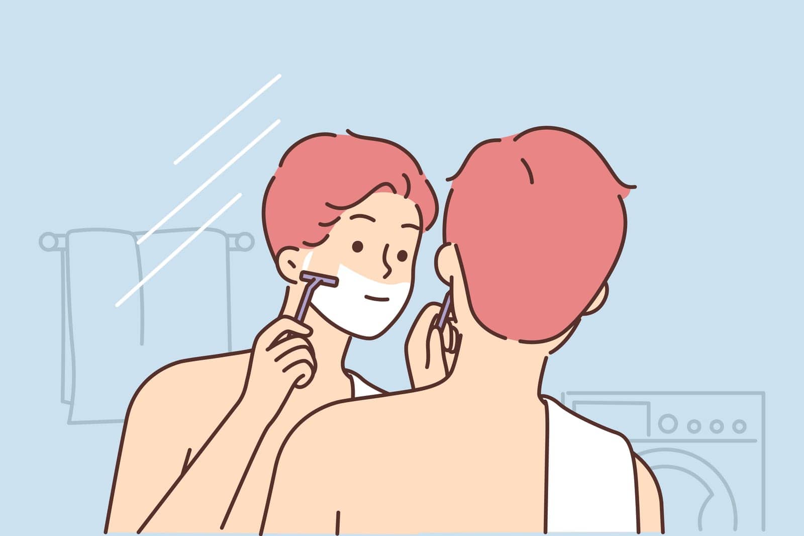 Man shaves face standing in bathroom and looking in mirror doing daily morning hygiene routine by Vasilyeu