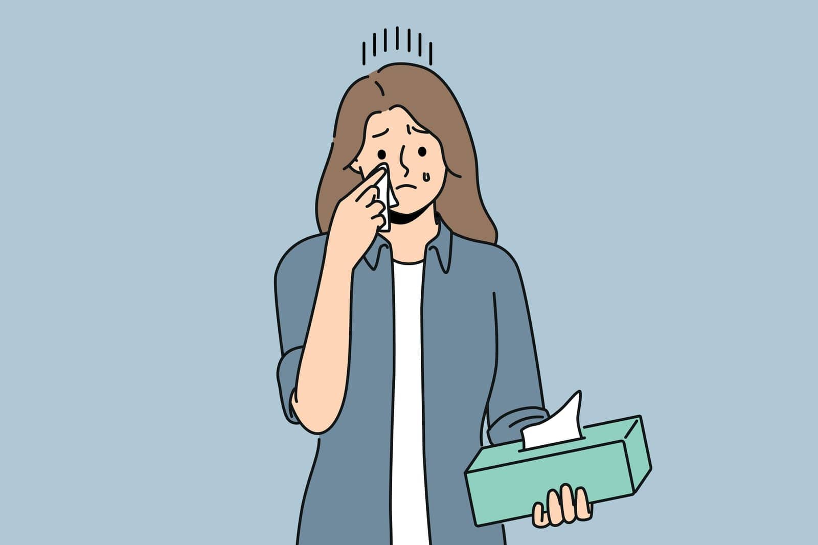 Crying woman wipes tears with paper napkins, experiencing stress and psychological suffering after breaking up with boyfriend. Crying girl holding box of disposable towels needing help of psychologist