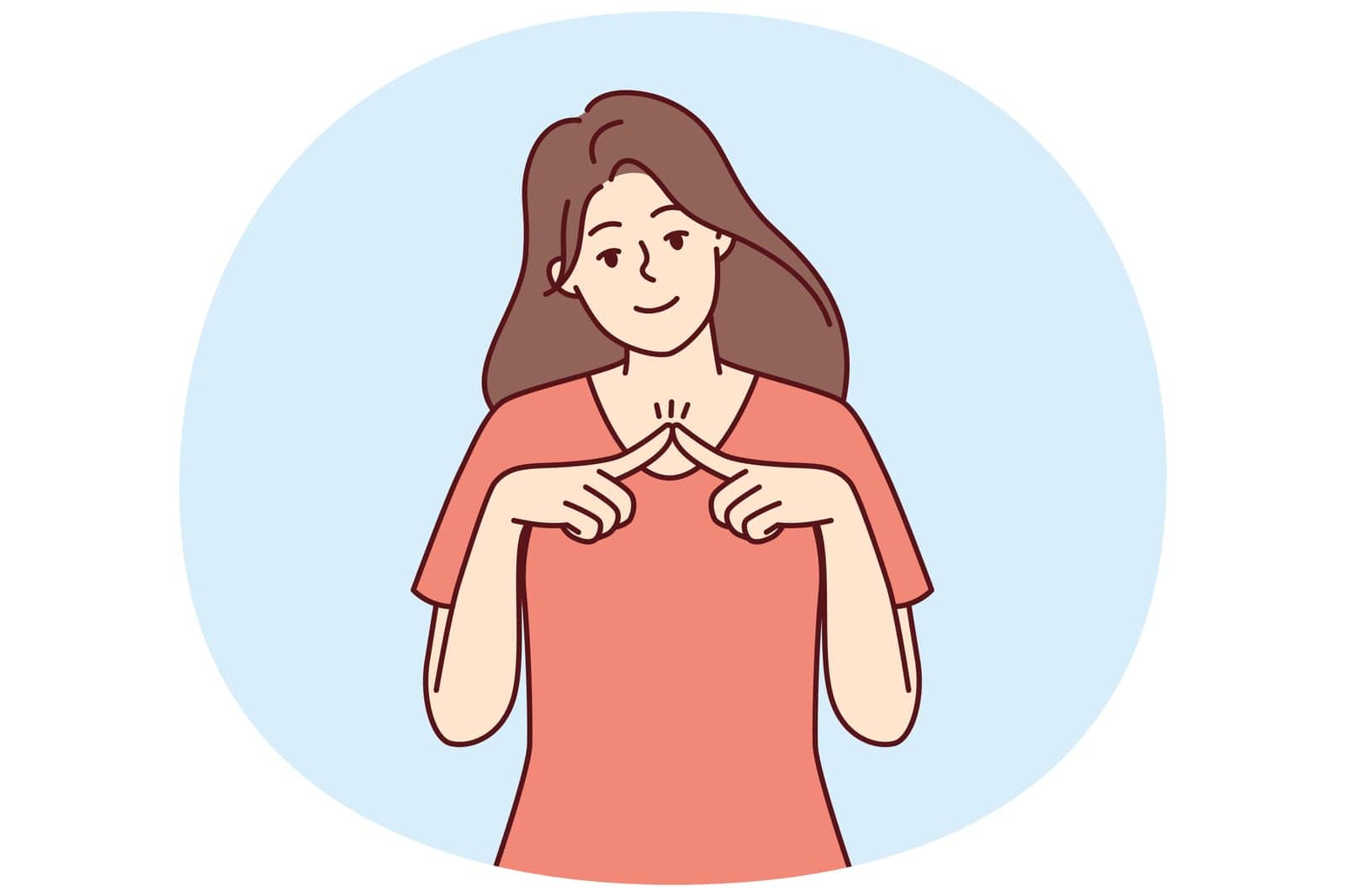 Shy girl looks at camera and joins fingers in front of chest, wanting to seduce guy. Modest young woman dressed in casual t-shirt shyly tries to flirt and attract attention of interlocutor
