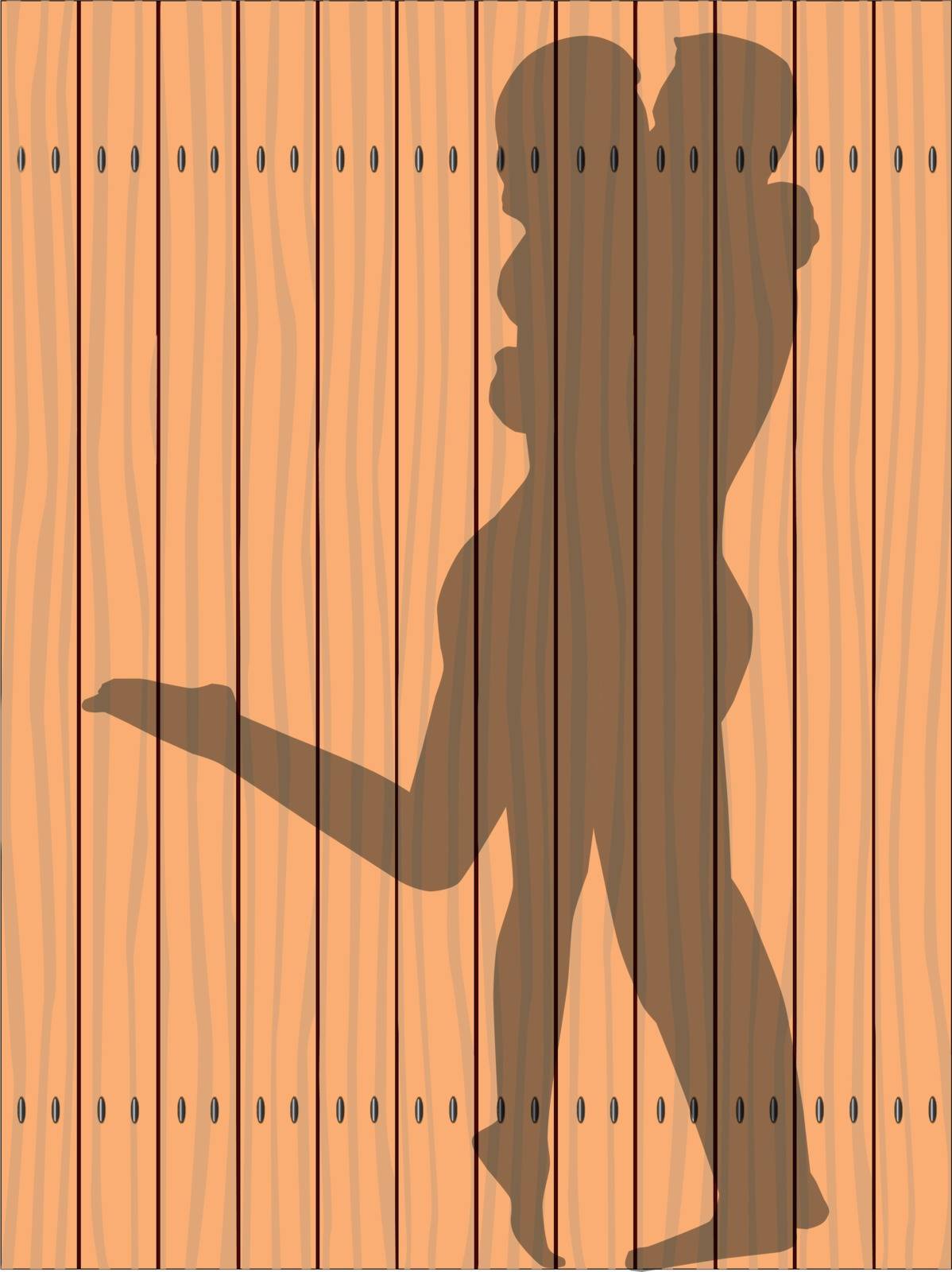 A silhouette of a kissing couple on a wooden fence
