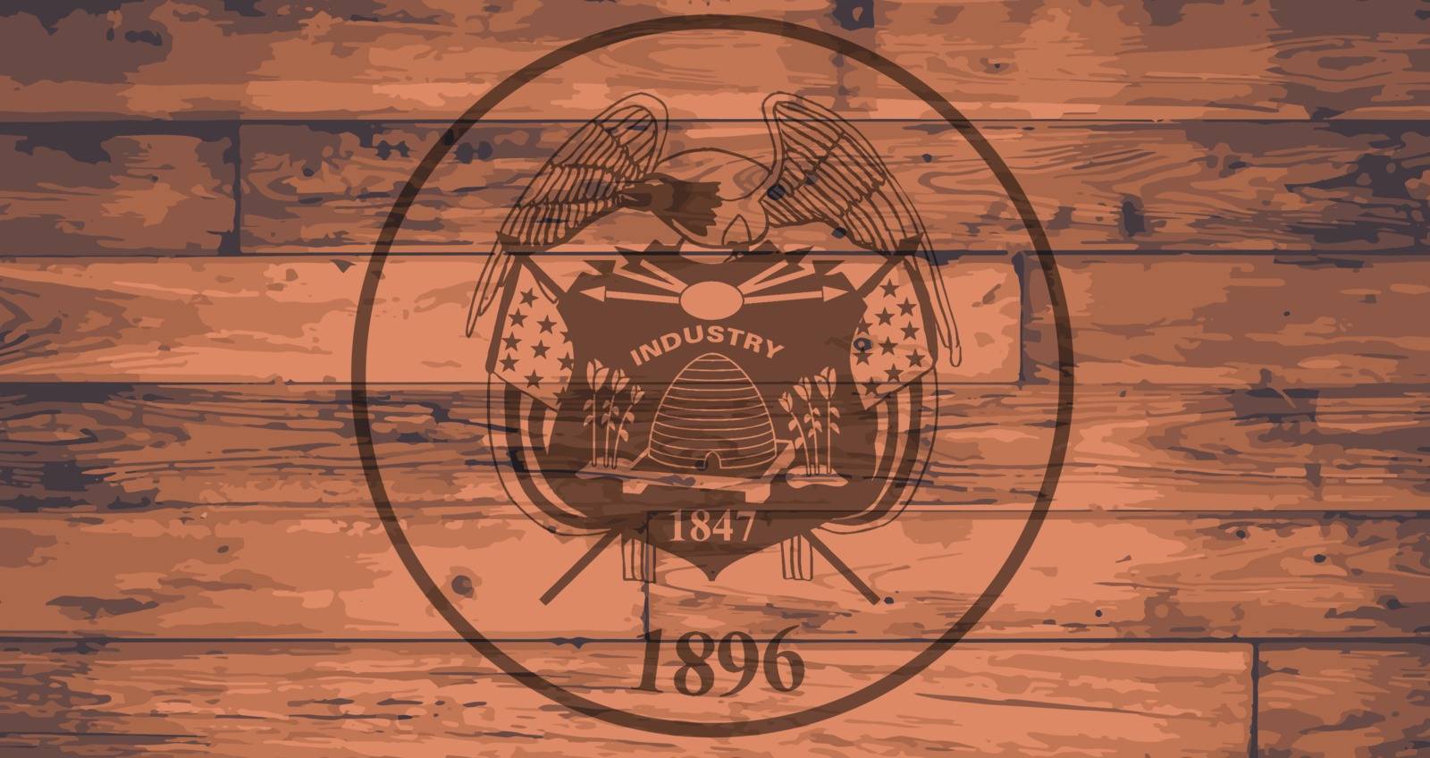 Utah State Flag branded onto wooden planks