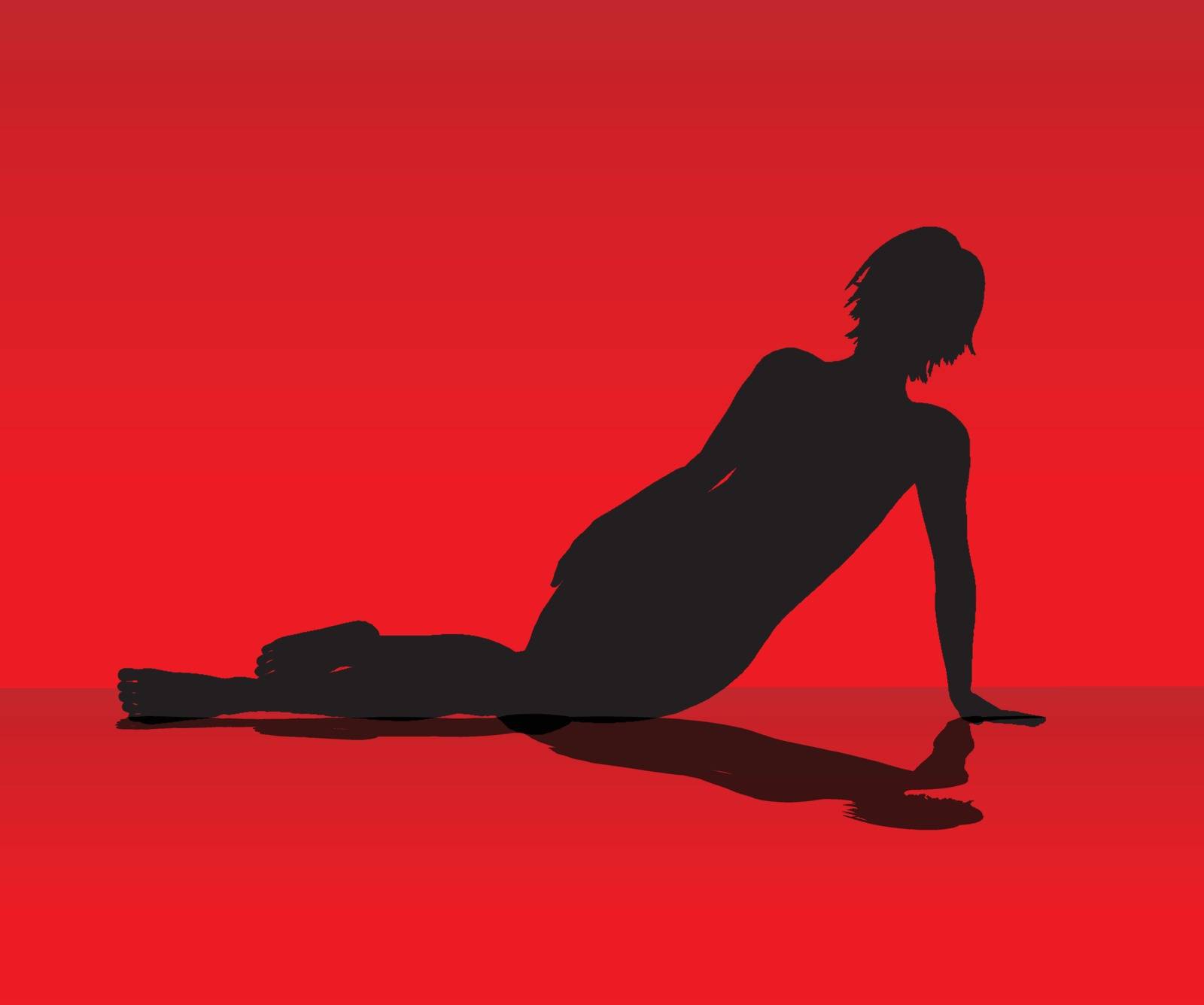 A female model resting on the floor set against a red background