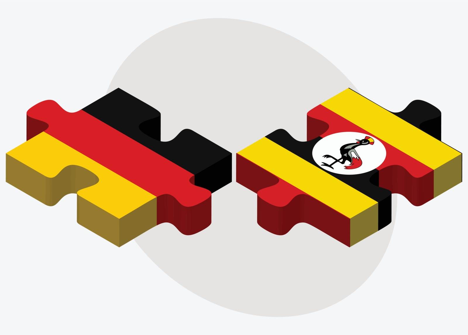 Germany and Uganda Flags in puzzle isolated on white background