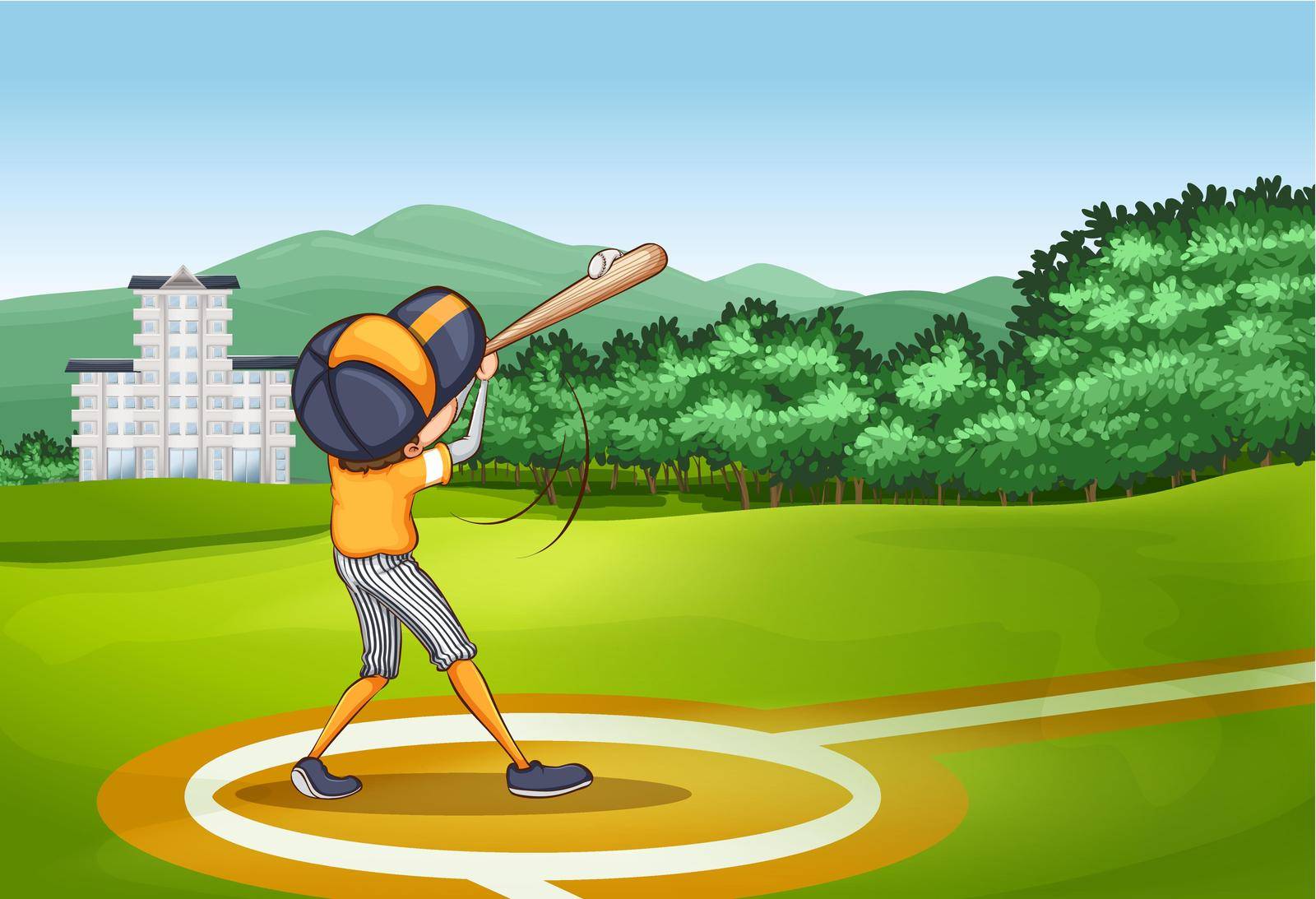 Boy hitting ball with baseball bat in the field
